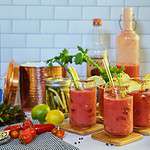 Incredibly fresh and homemade bloody mary mix with sprigs of celery and other vegetables