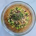 Simple and fresh broccoli cranberry salad with walnuts, photographed from above