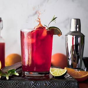 Unique cocktail pairing of rosemary and rhubarb makes a bright and beautiful margarita